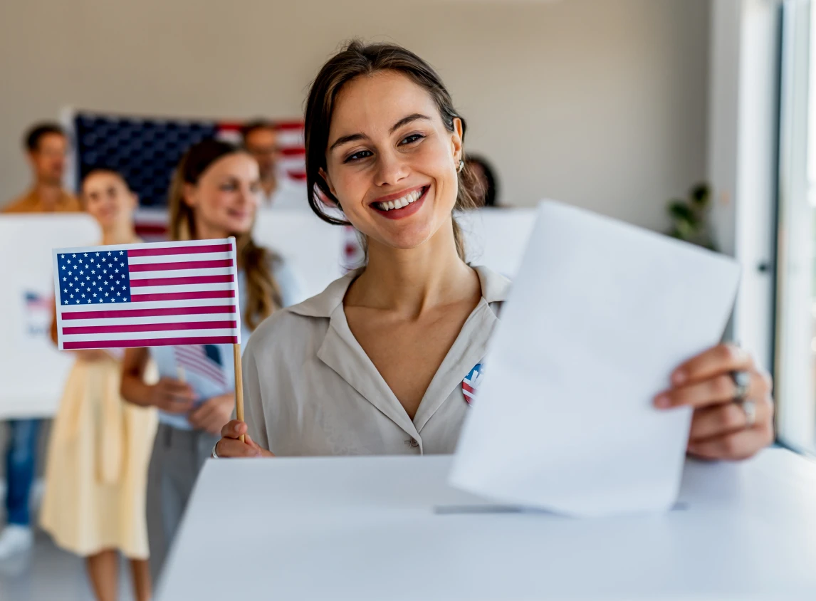 Woman voting with American flag